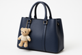 Women's Navy Blue Leather Handbag with Teddy Bear Charm - Whimsy Collection